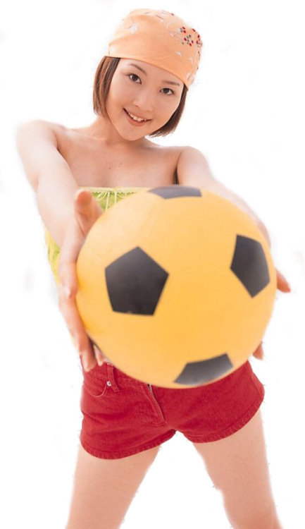 Gorgeous japanese actress Akira Watase is undressing, with red short pants.
